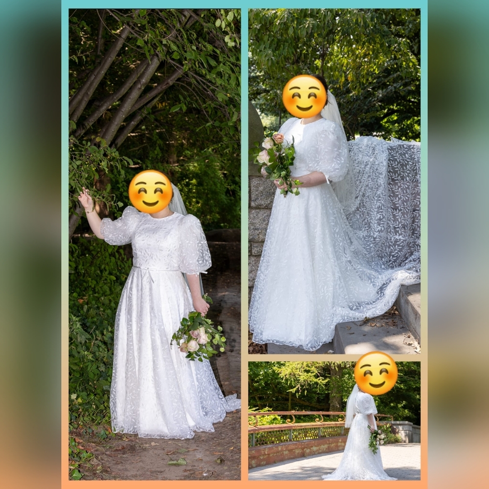A beautiful modest bridal gown with 3/4 sleeves and lace detailing